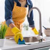 Cleaning kitchen sink and cookware, highlighting hidden plastics in food storage and packaging.